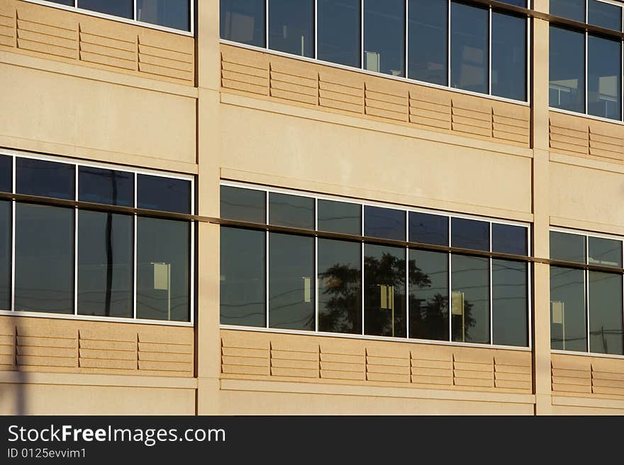 An office building with a empty parking lot