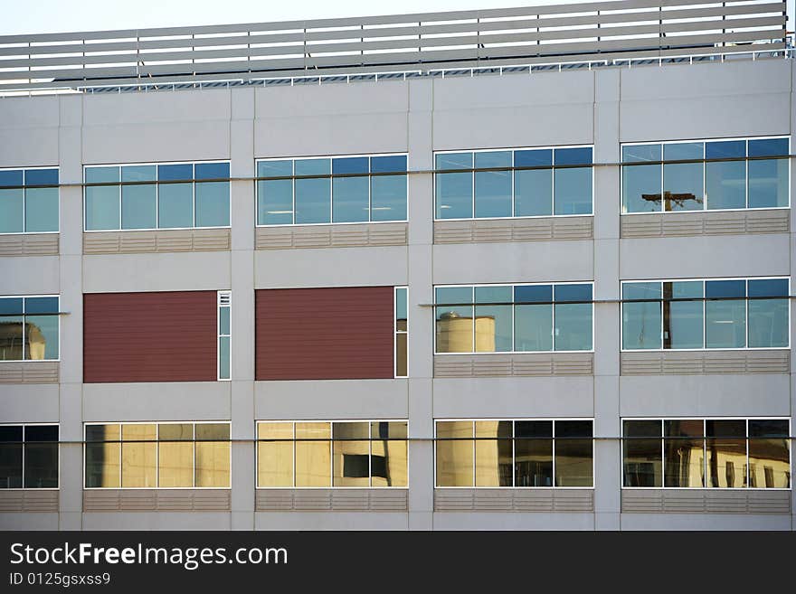 An office building with a empty parking lot