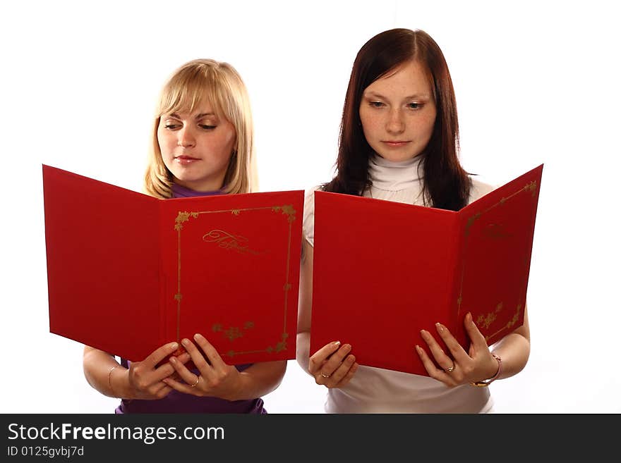 Two girls read congratulation on white background