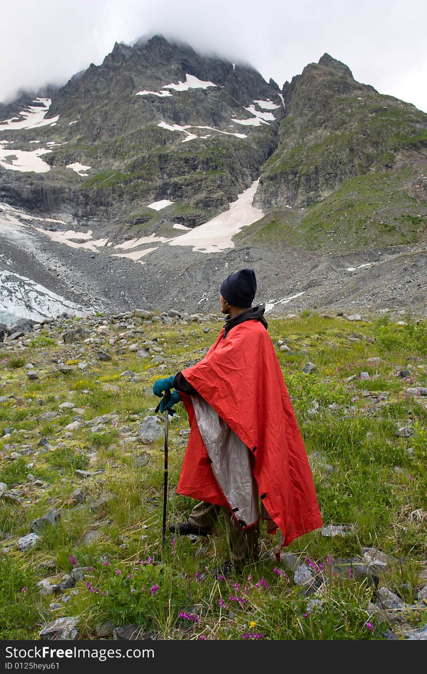 Man in red cape