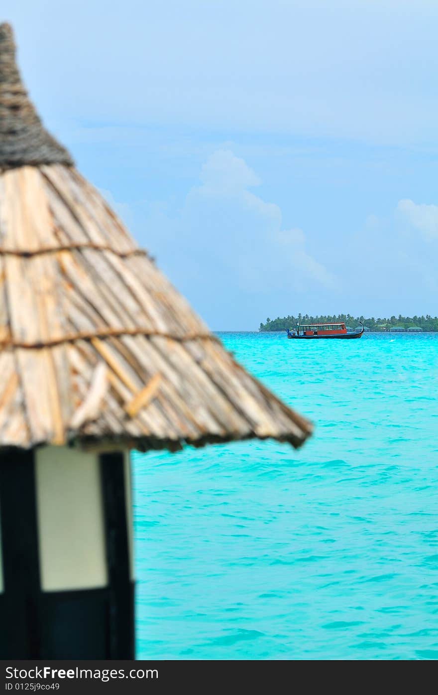 Island of Paradise. White sand beaches with coco-tree and crystal blue water. Maldives. Luxury holidays. Island of Paradise. White sand beaches with coco-tree and crystal blue water. Maldives. Luxury holidays.