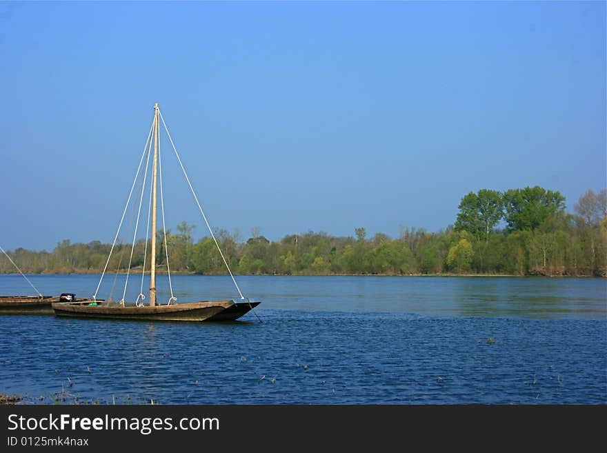 A boat on the river. A boat on the river