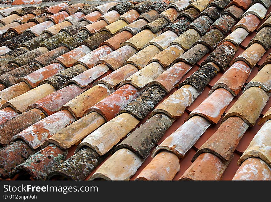 On a photo close up of a tile roof