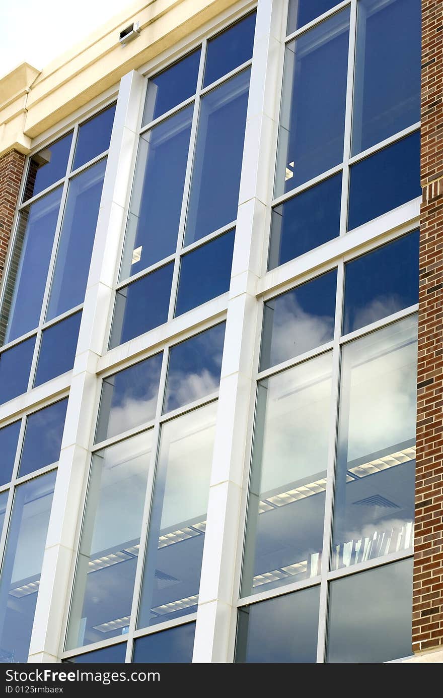 Looking up at the windows on a building wall. Looking up at the windows on a building wall.