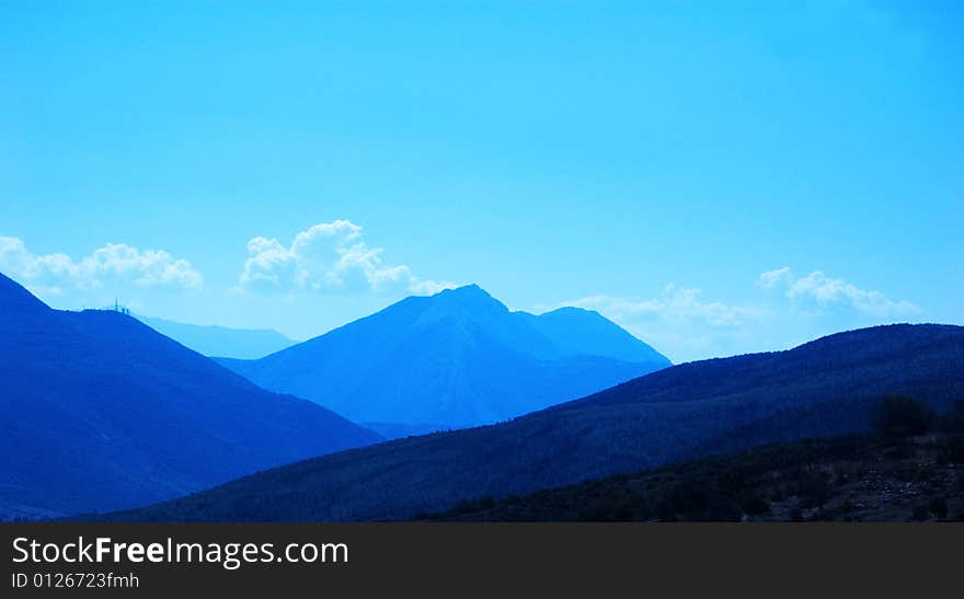 Blue mountains background with blue sky. Blue mountains background with blue sky