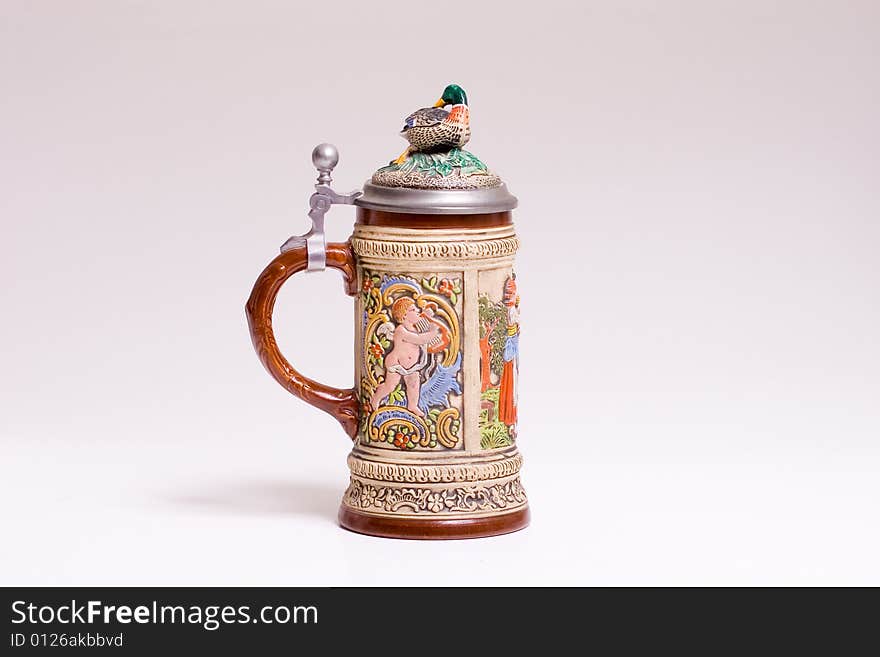 A colorful ceramic beer stein from Austria or Germany. A colorful ceramic beer stein from Austria or Germany