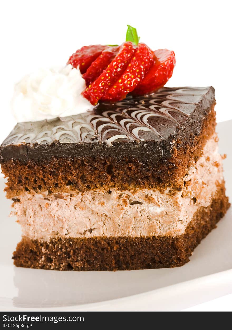 Piece of chocolate cake with strawberry