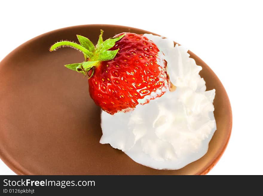 Strawberry on plate over white background