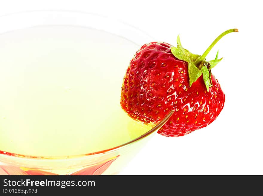 Strawberry with glass of juice isolated