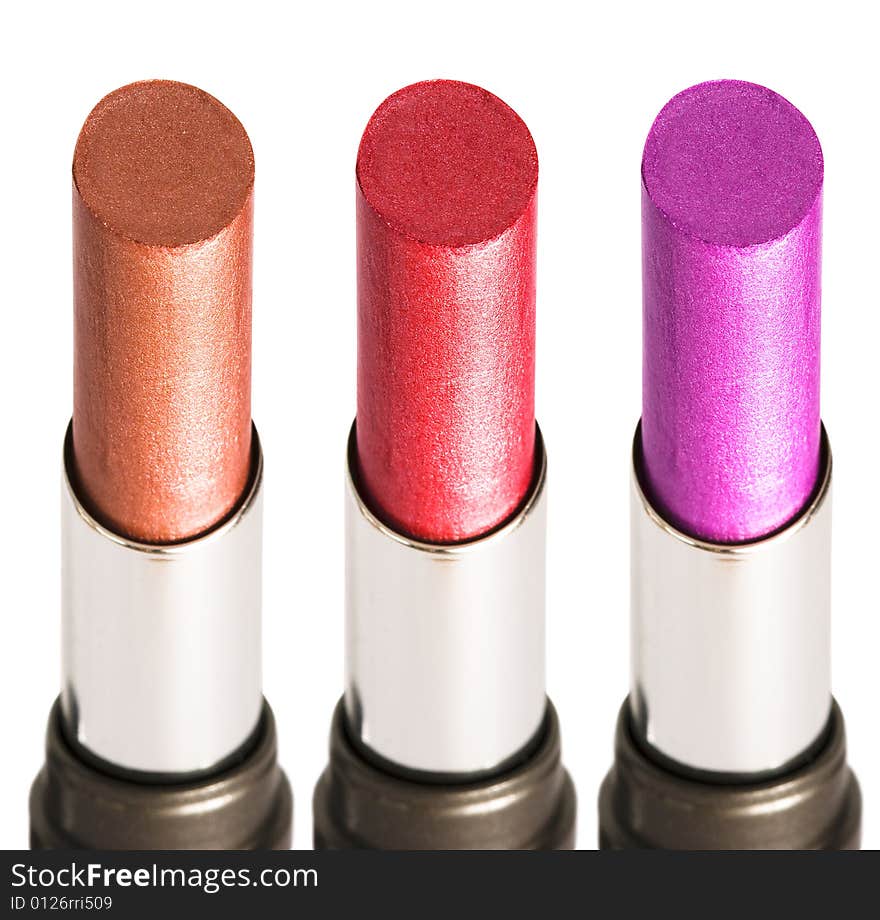 Three colored lipsticks