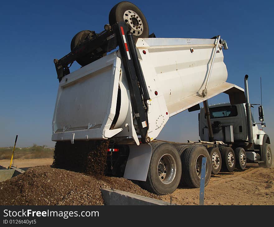 Dump Truck Dumping Dirt - Horizontal