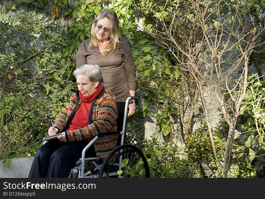 Woman With Mother In Garden - Horizontal