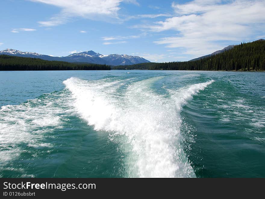 Waves caused by the Motor Boat driving on the Magline Lake Jasper National Park Alberta Canada