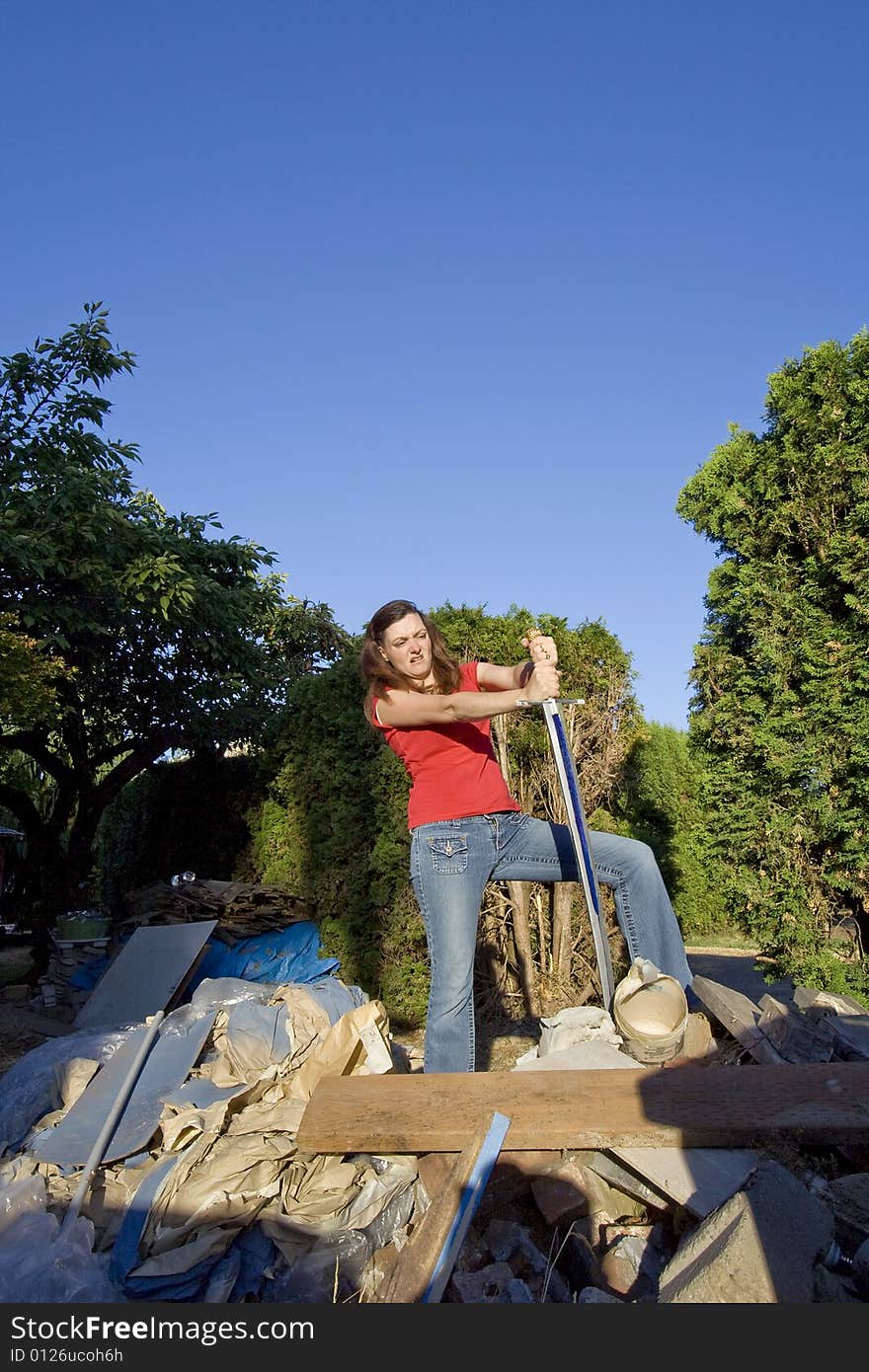 Woman In A Pile Of Rubble -Vertical