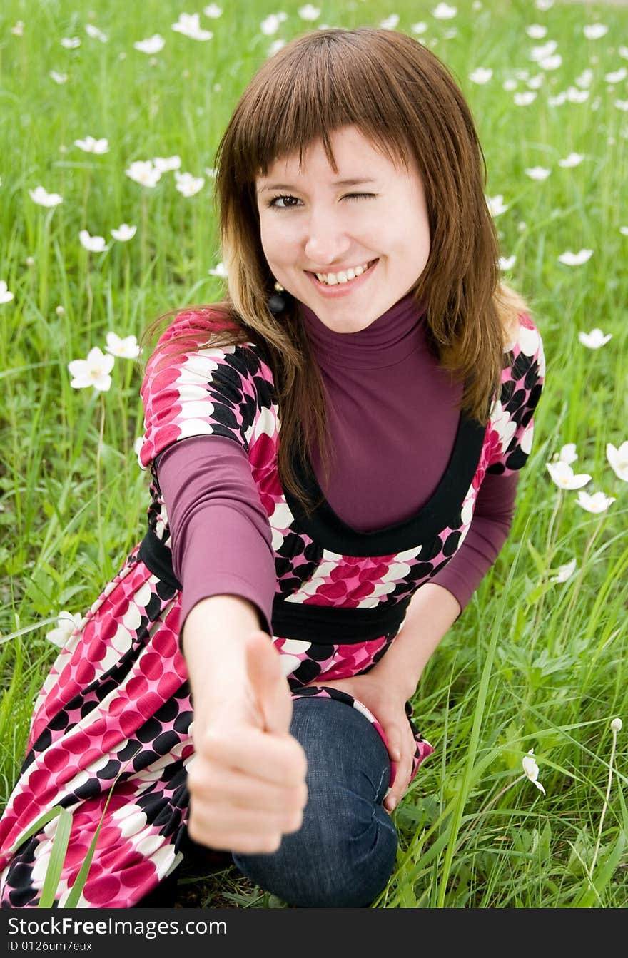 Pretty girl with her thumb up