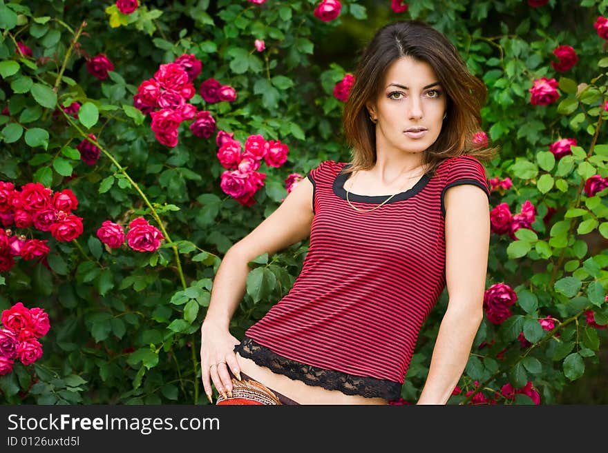 Woman in garden with flowers