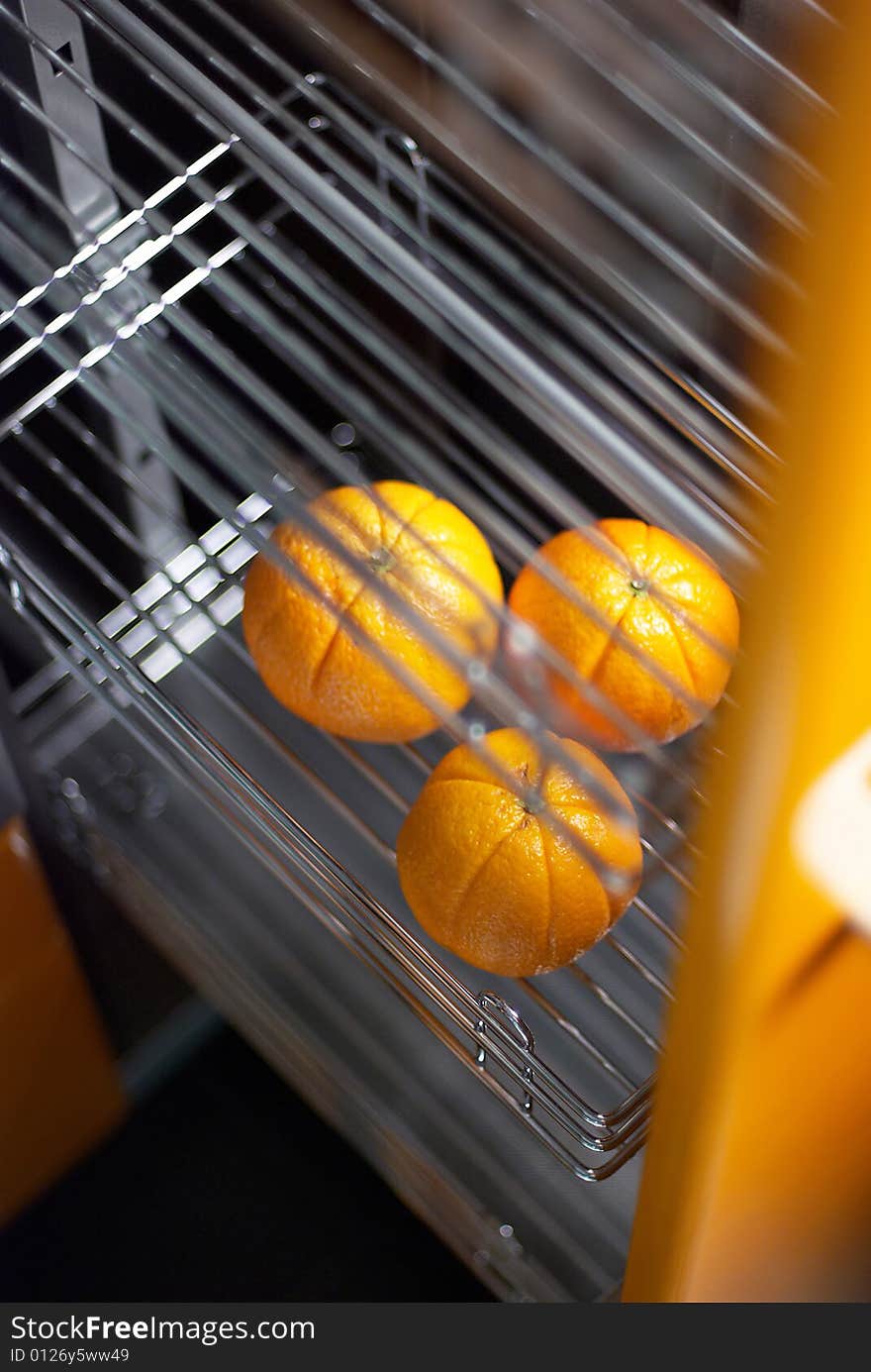 Tasty orange in kitchen in fridge