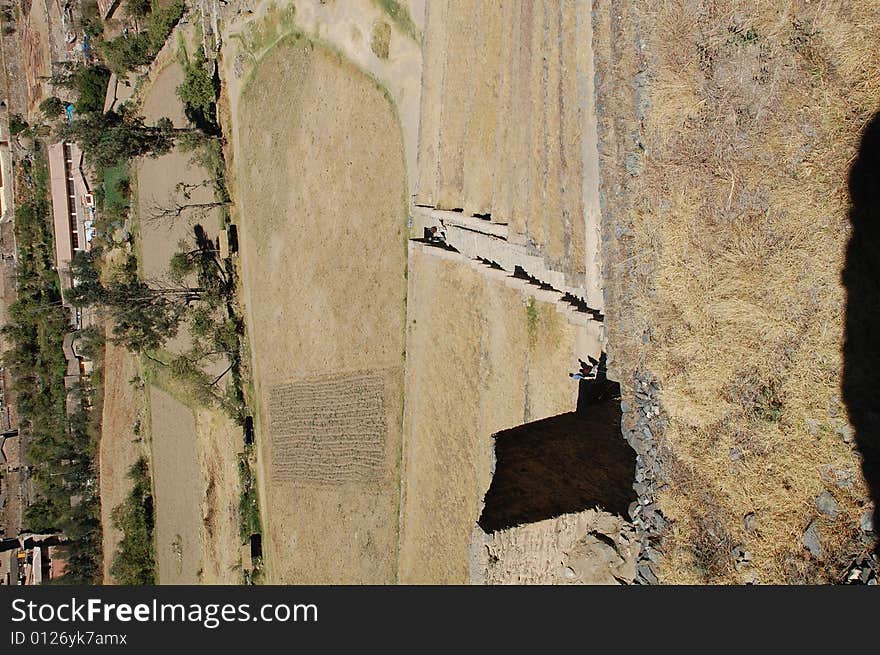 This picture is of the incan stairs looking down from the ruins of ollayantambo peru. This picture is of the incan stairs looking down from the ruins of ollayantambo peru