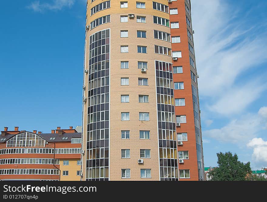 High multistory house of red and yellow bricks