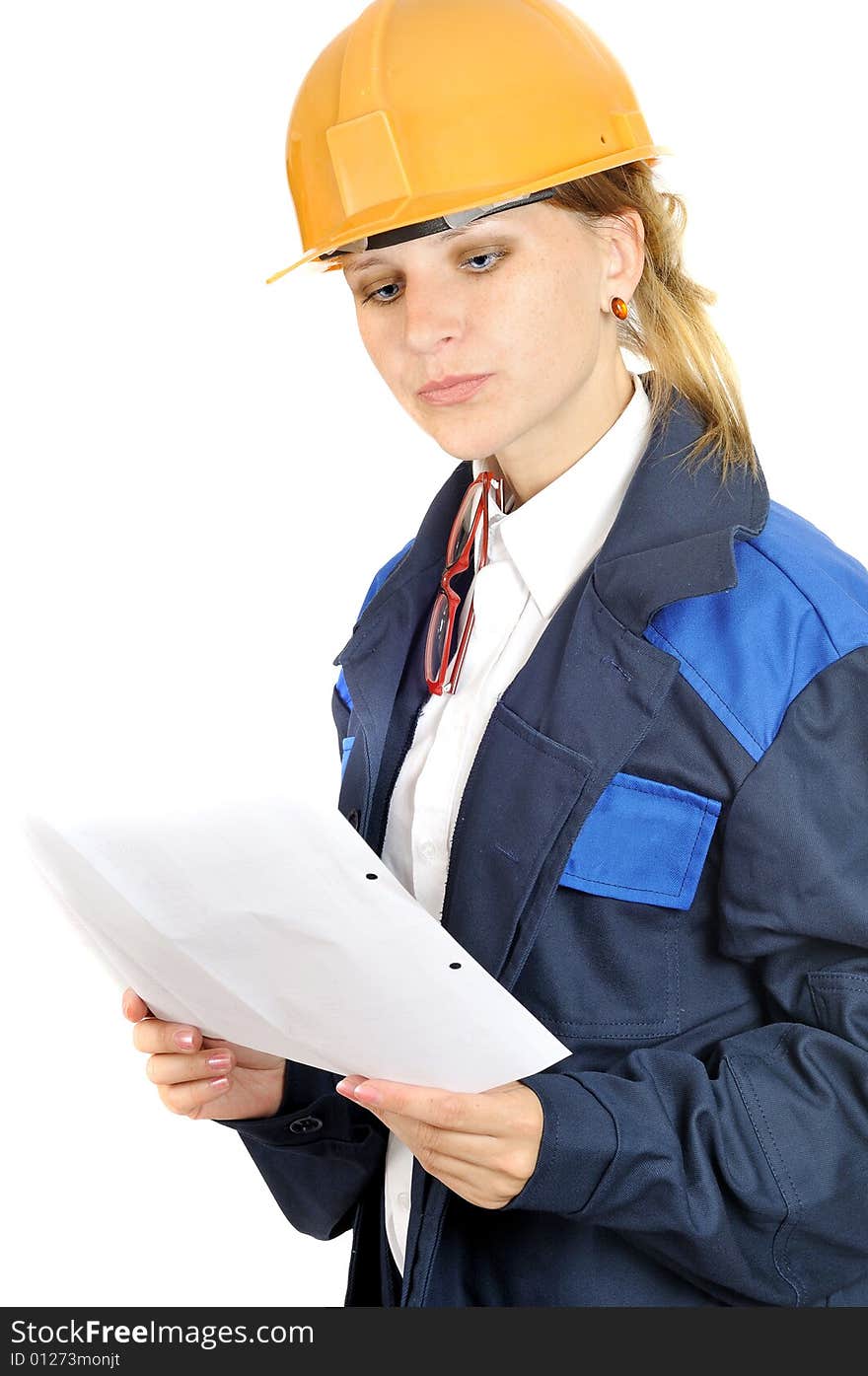 Attractive engineer woman reads paper