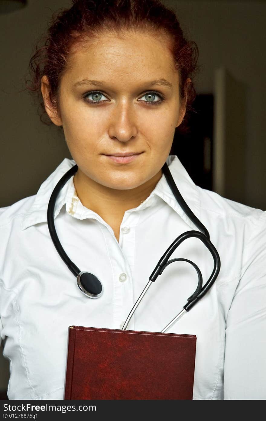 Young female doctor in clinic. Young female doctor in clinic.