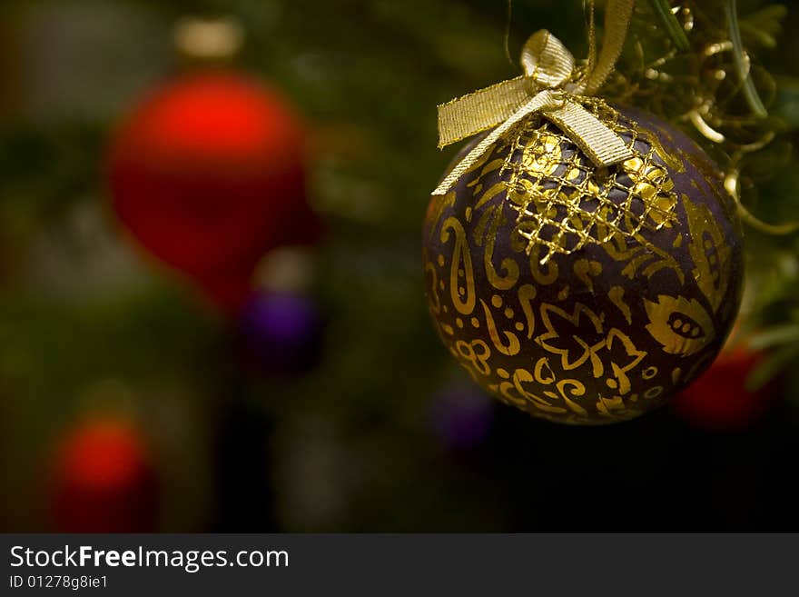 Gold glass ball on the Christmas tree