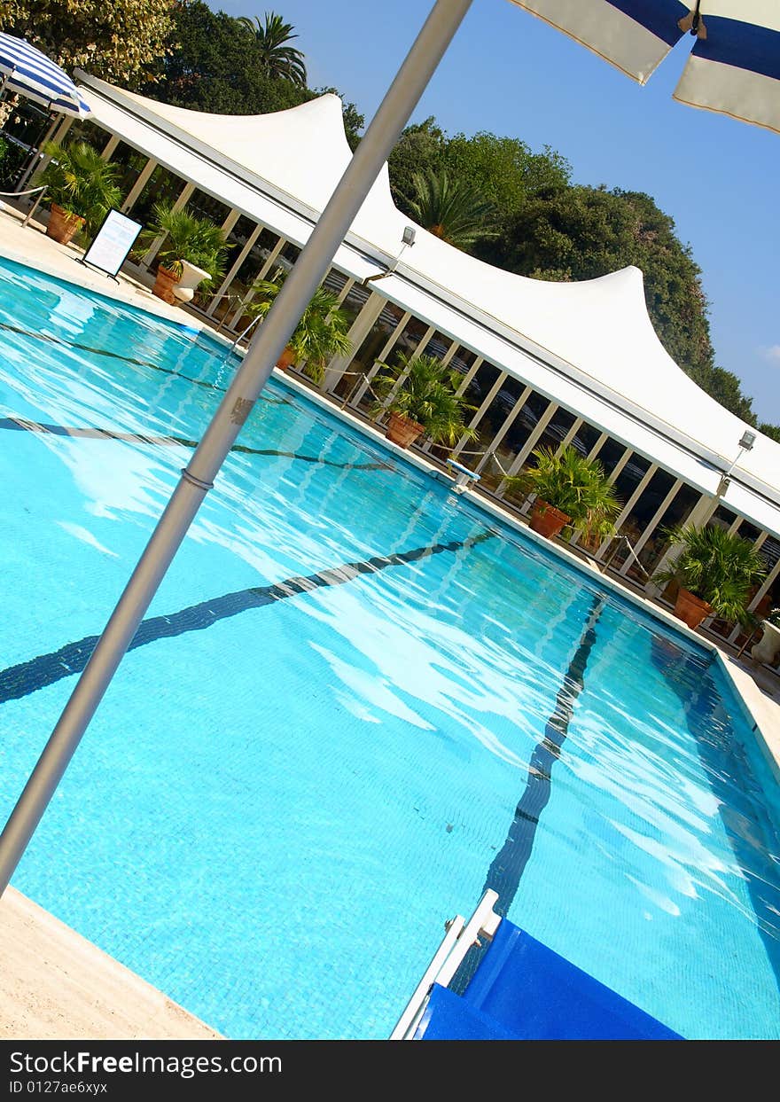 An original shot of a pool in a hotel