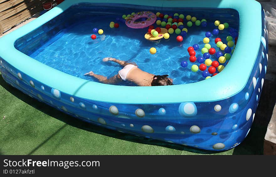 A big blue swimming pool