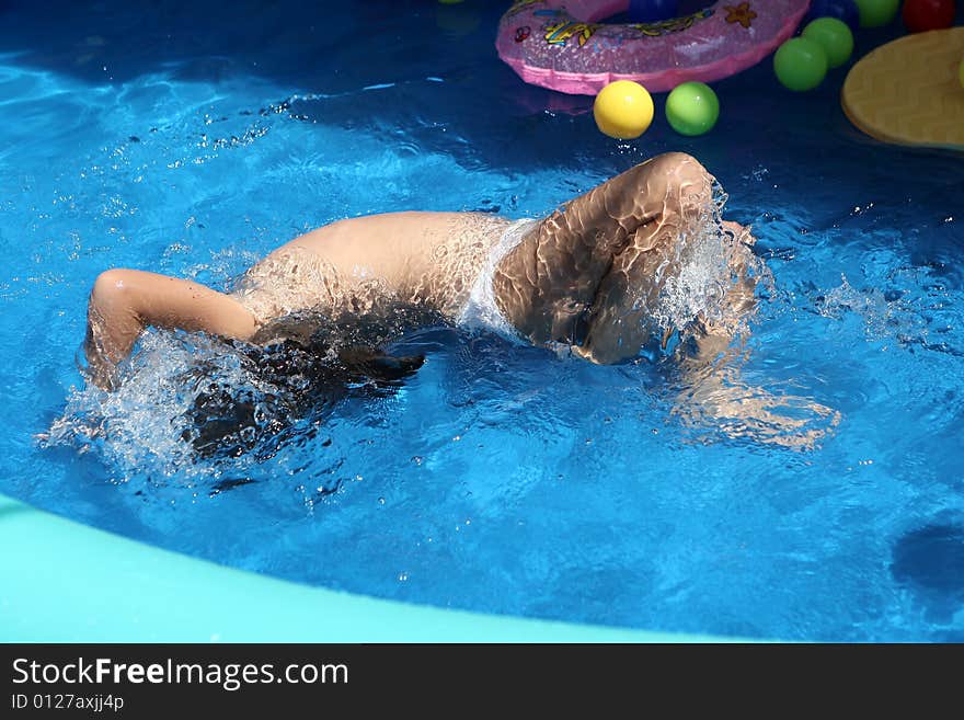 A big blue swimming pool