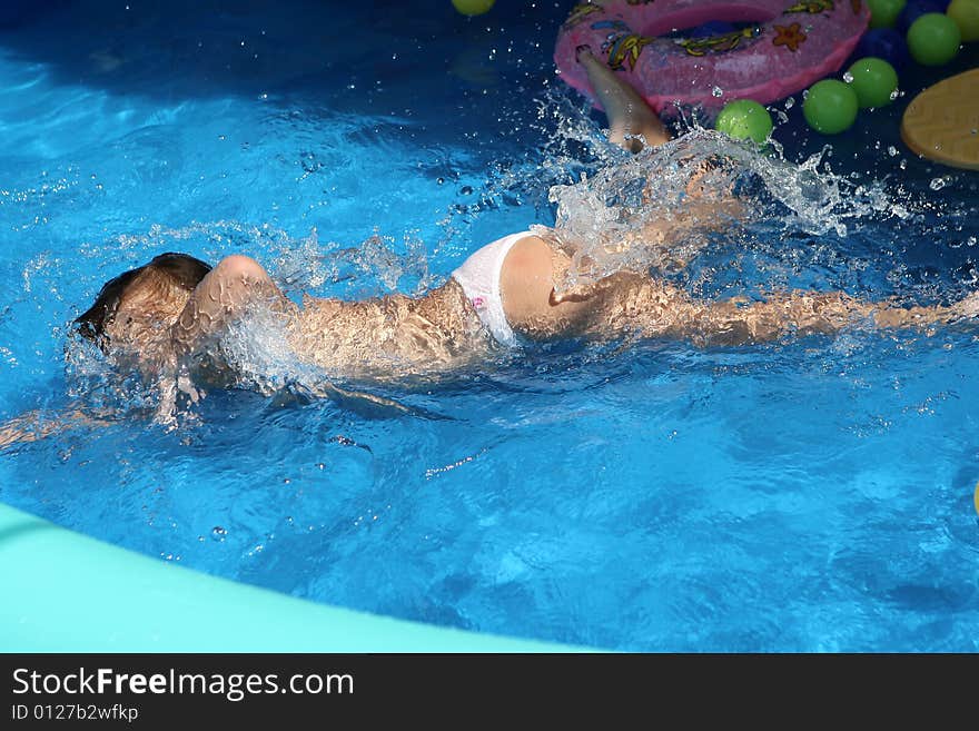 A big blue swimming pool