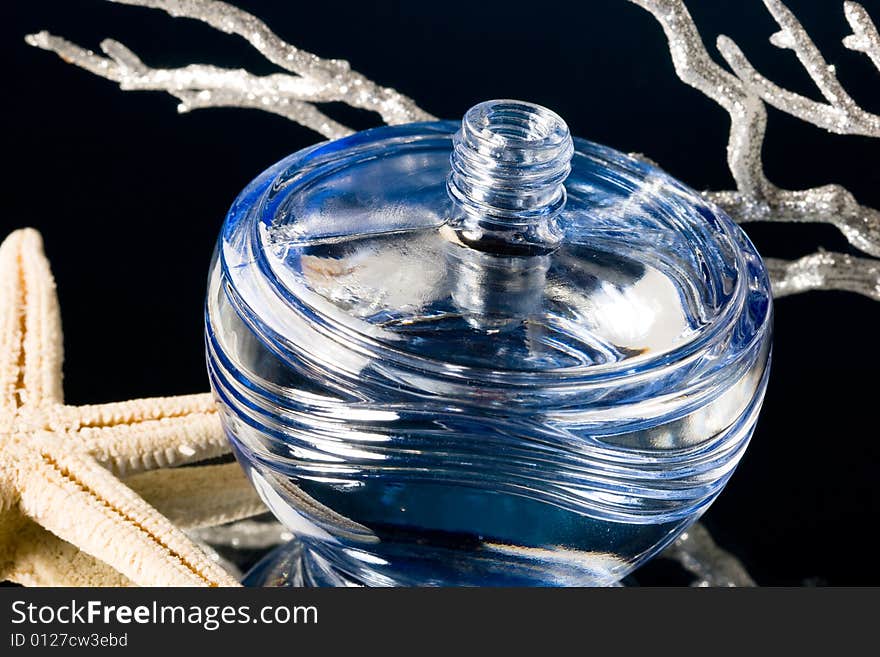 Blue bottle of perfume