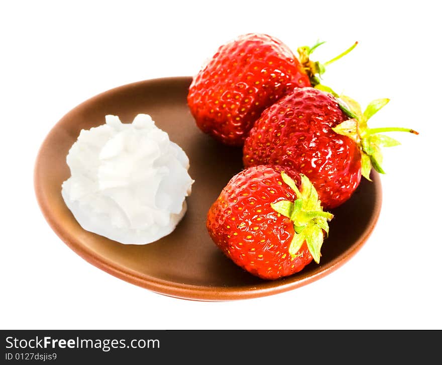 Strawberry on plate over white background