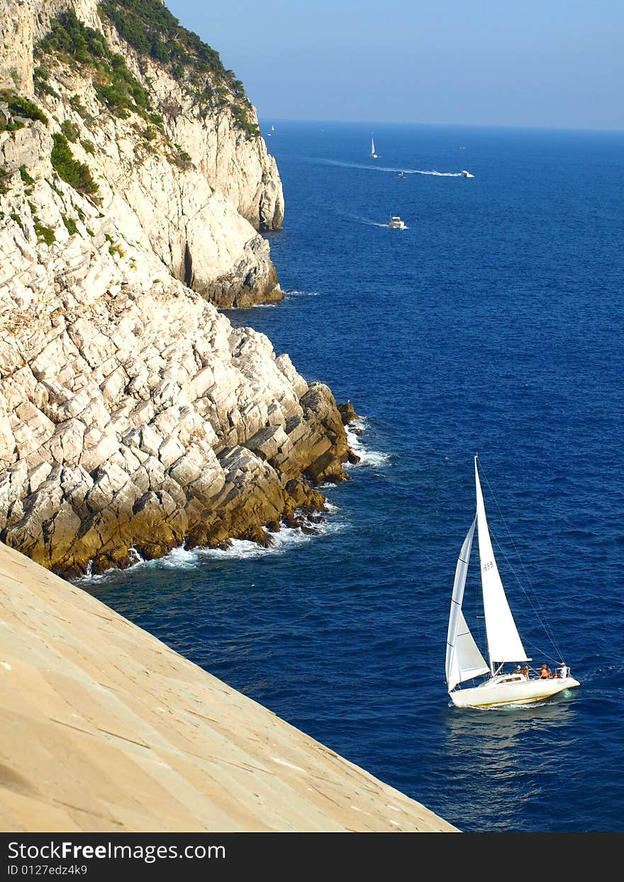 A fantastic shot of the entrance of Porto Venere port viewed by San Pietro church. A fantastic shot of the entrance of Porto Venere port viewed by San Pietro church