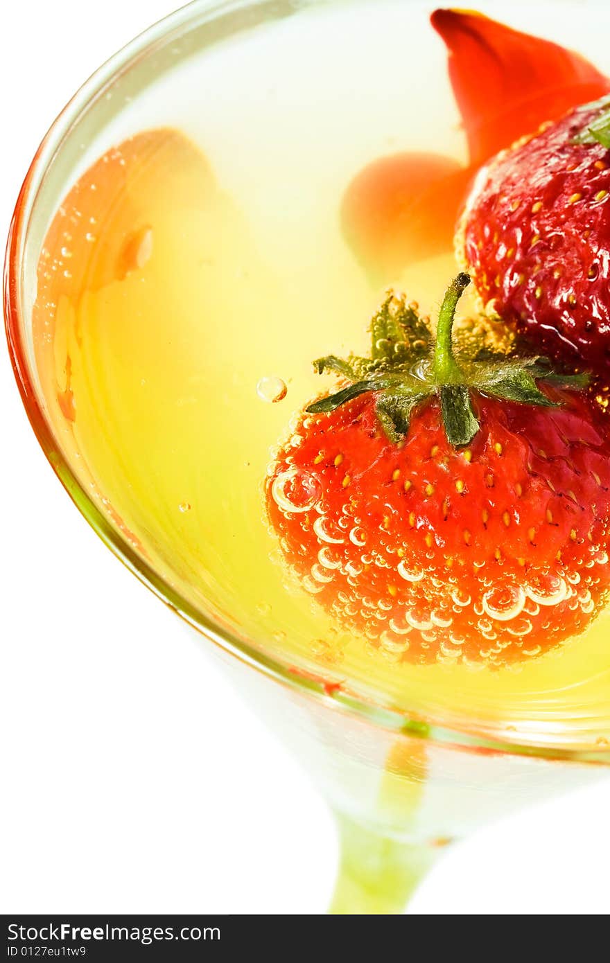 Strawberry with glass of juice isolated