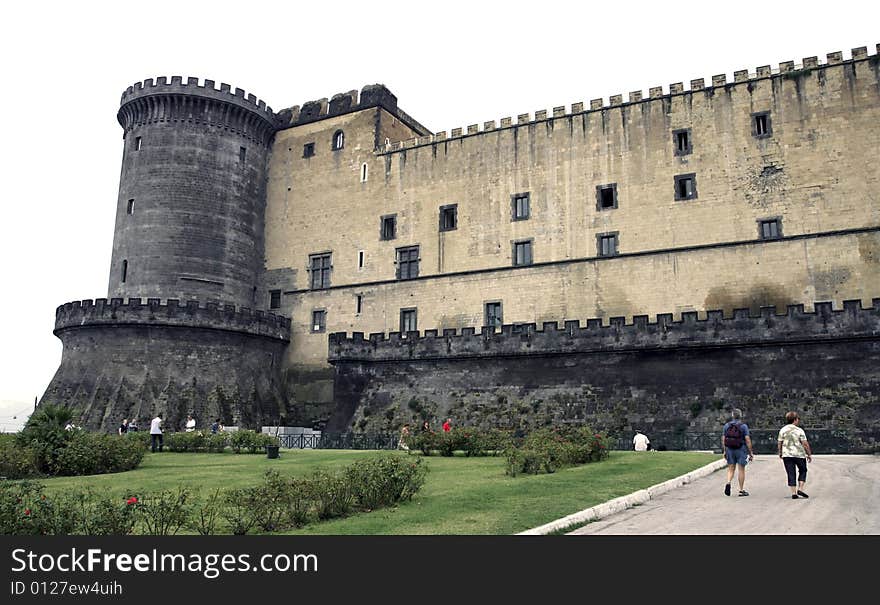 Castel Nuovo (New Castle), also called Maschio Angioino, medieval castle in Naples, Italy. Towers and renaissance portal. Low angle view