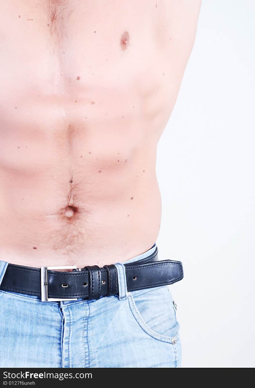 Body of young athlete man at white isolated background