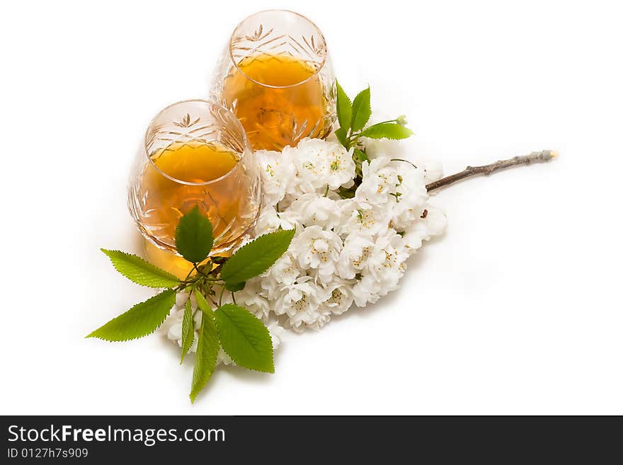 Two glasses and chsrry flowers