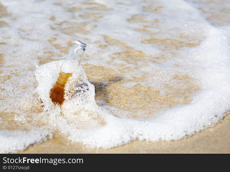 Bottle of Beer on a Beach