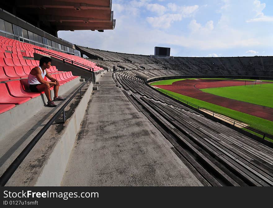 Picture of an athlete looking into empty space. Useful for describing loneliness, failure, rejection, etc. Picture of an athlete looking into empty space. Useful for describing loneliness, failure, rejection, etc.