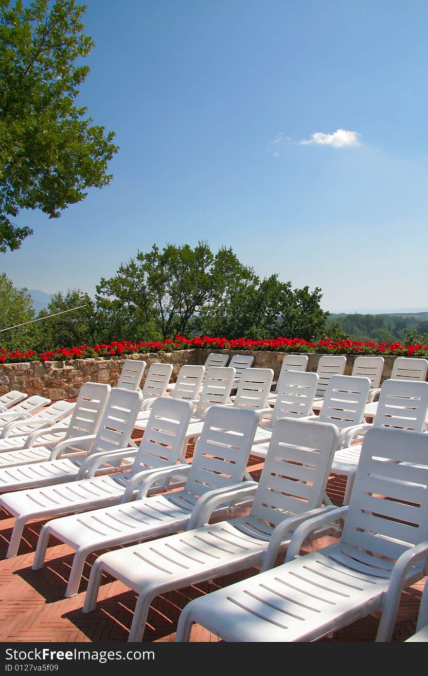 Empty pool chairs