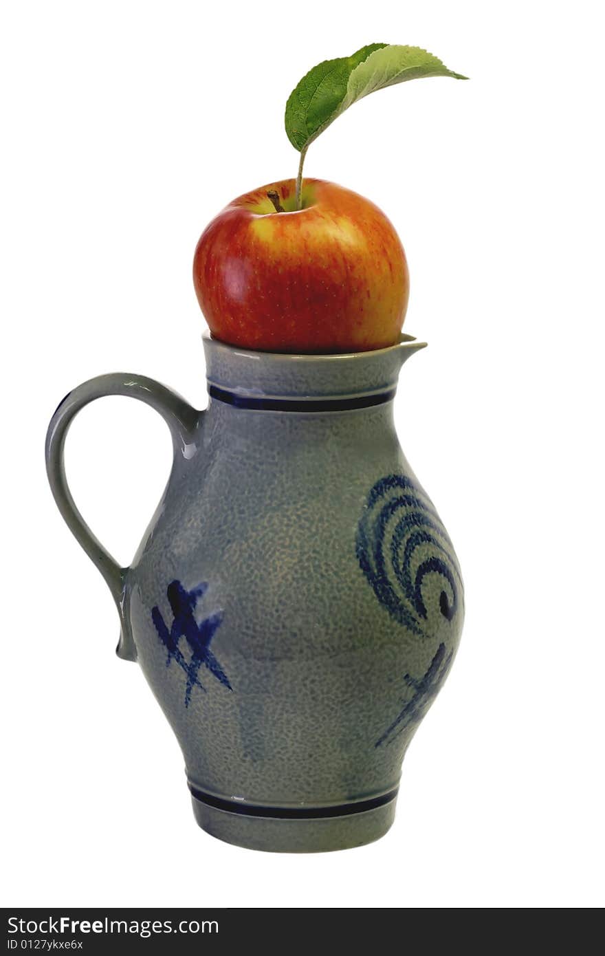 Jug of apple wine with an apple on white background. Jug of apple wine with an apple on white background