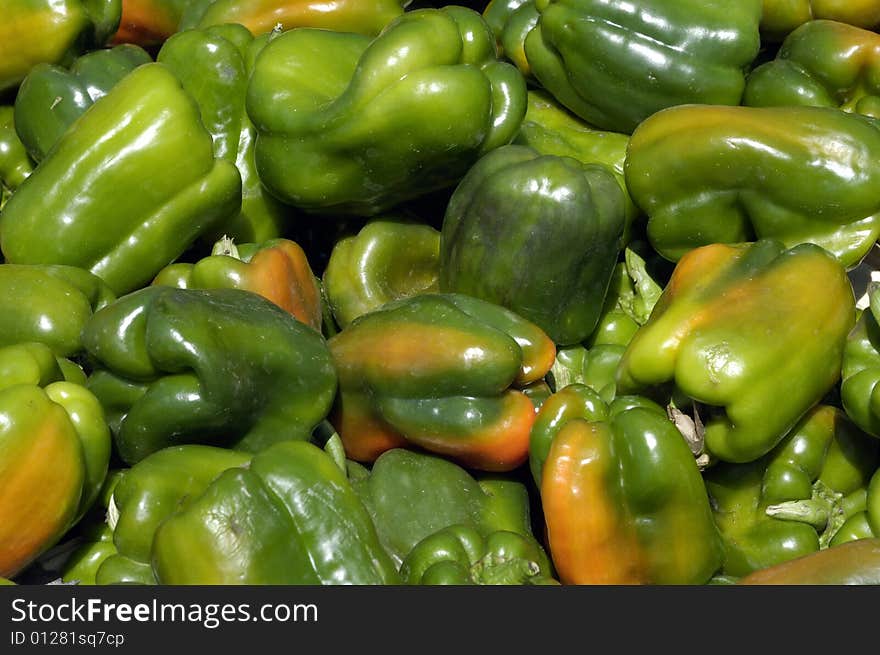 It is a picture of a stall of green peppers