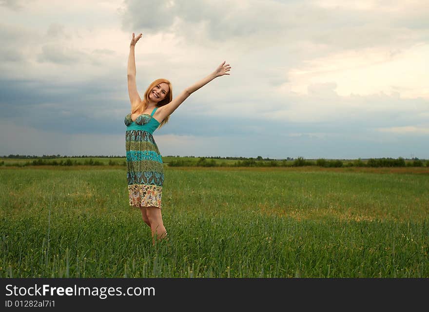 Happy girl in a field. Happy girl in a field