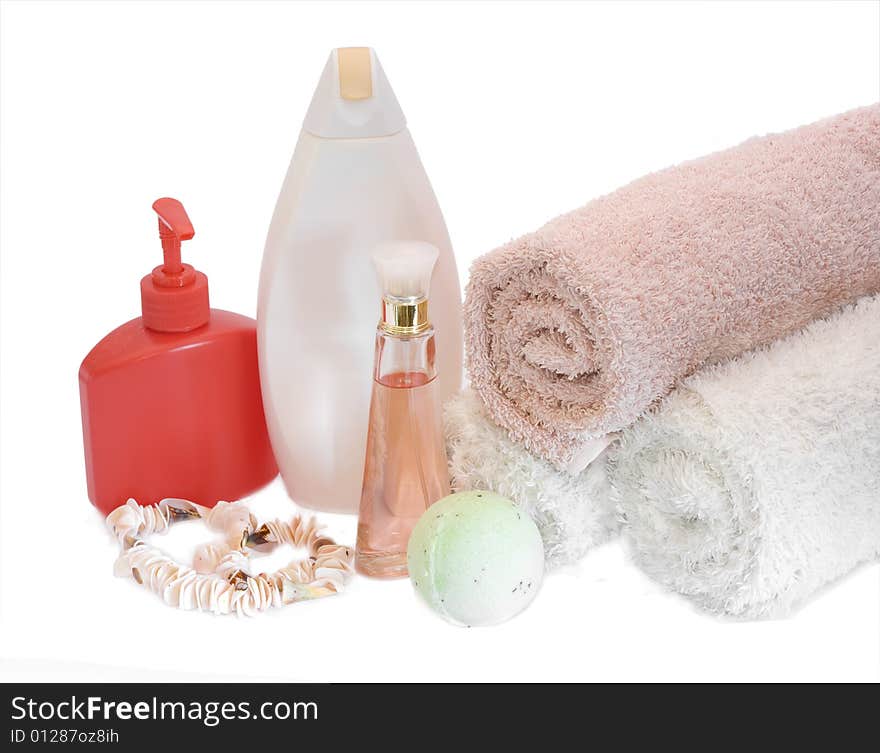 Spa aromatherapy and towels on white background