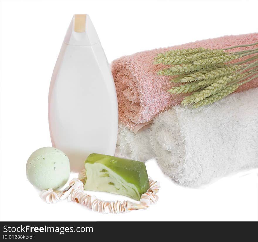 Spa aromatherapy and towels on white background