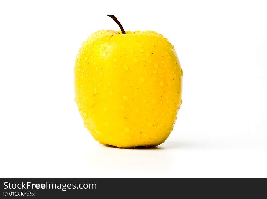 Whole apple with water drops