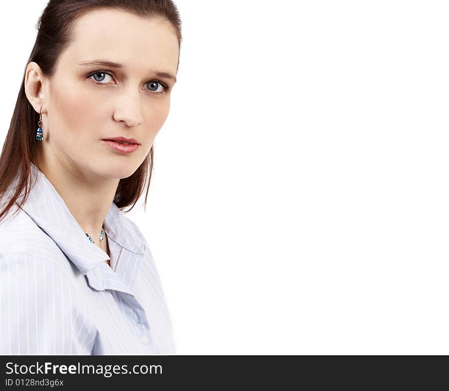 Beautiful brunette businesswoman wearing blue shirt. Isolated on white background with copy space