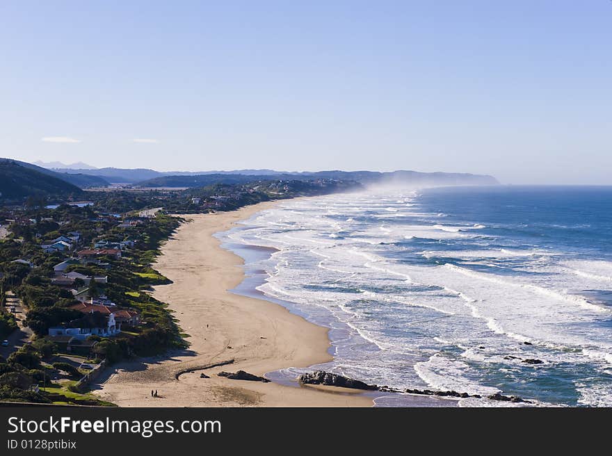 The beautiful long sandy beach of the South African town called Wilderness. The beautiful long sandy beach of the South African town called Wilderness.