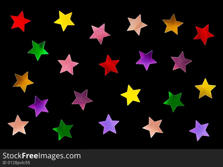 Collection of multicolored stars isolated on black background