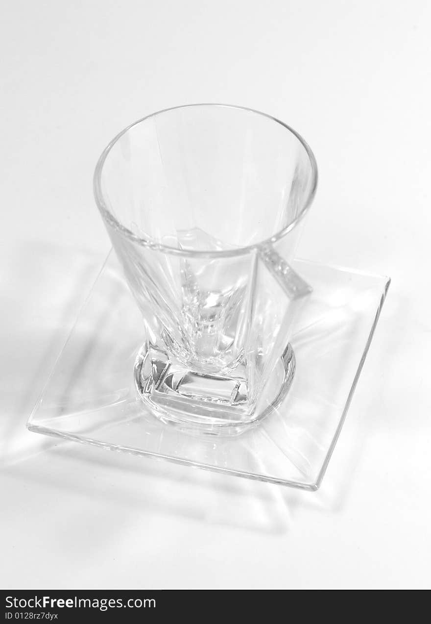 Glass Cup On A Plate